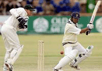 Batsman Shiv Sunder Das cuts a delivery watched by Zimbabwean wicket keeper Andy Flower in Bulawayo on Sunday as India win by eight wickets to mark the first victory in 15 years outside the subcontinent.