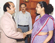 Ms Meira Shankar from India and Mohd. Janibul Haque from Bangladesh greet each other before the official-level talks in New Delhi on Tuesday.