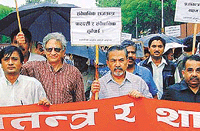 Over 200 activists of the "Save the Democracy and Human Rights Society" hold a silent demonstration on Thursday.