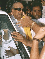 Mr Muthuvel Karunanidhi, former Chief Minister of Tamil Nadu, is surrounded by supporters outside a police station after his release in Chennai on Wednesday. 