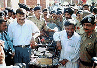 Vikas Singh, an Indian cyclist, crosses the Wagah border on July 5 after being released by Pakistan.