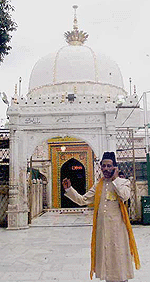 A khadim receiving the information of cancellation of Pakistan President Pervez Musharraf visit to dargah of Sufi Saint Khwaja Moinuddin Chisti, in Ajmer on Monday. 