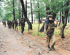 Army patrolling a forward village in north Kashmir to foil any attempt of militants to intensify their activities after the breakdown in the Indo-Pak summit. 