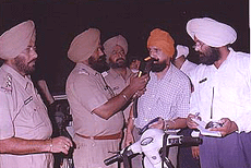 Traffic Police officials check for drunken driving on the Mall, Patiala.