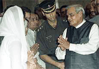Prime Minister Atal Behari Vajpayee greets the widows of soldiers.