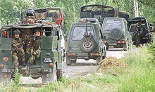 Troop reinforcements rush to the scene of a gunbattle.