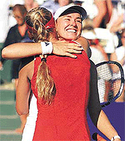 Lindsay Acura on Switzerland   S Martina Hingis  R  Hugs Russian Partner Anna