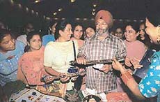 The Director-General of the Punjab Police, Mr Sarabjit Singh, and successful participants of the Springboard Women Development Programme are all smiles after the valedictory function held in Chandigarh on Monday.