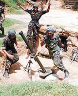 Army men retaliate against Pakistani shelling in the Naushera sector of Jammu and Kashmir on Thursday. 