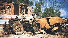 Remains of a tipper vehicle driven by a suicide bomber that was blown in the attack on a CRPF and SOG camp at Magam 