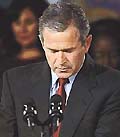 President George W. Bush asks for a moment of silence after the New York crashes.