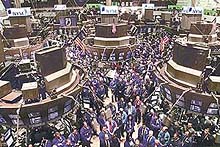 Traders observe a moment of silence in honour of the victims of the World Trade Center disaster on the floor of the New York Stock Exchange on Monday.