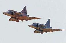 Two Swedish Viggents fighters fly over Krumovo airport near the city of Plovdiv, some 125 km east of Sofia, during a NATO military exercise on Thursday.