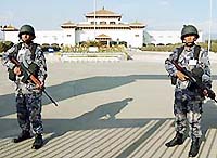 Nepalese soldiers stand guard in front of the Birendra International Convention Centre in Kathmandu