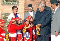 Prime Minister Atal Behari Vajpayee receives garlands 