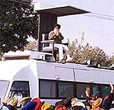Punjab Chief Minister Parkash Singh Badal atop a specially designed vehicle 
