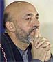 Afghan interim leader Hamid Karzai listens to a reporter's question during a news conference at the Japan National Press Club on Tuesday. 