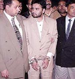Aftab Ansari being escorted by CBI officials after he was brought here from the UAE on Saturday.