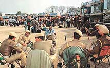 Trucks parked at the Fatehgarh Sahib polling material distribution centre to carry election materia