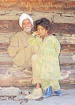 The head priest of Malana with a village girl