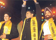 The men with the marvellous pecs: (R to L) First runners-up Jaspal Singh Sehgal of Mumbai, Grasim Mr India 2002 Raghu Mukherjee of Bangalore and the second runners-up Saumik Rao of Ahmedabad.