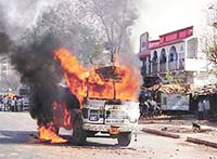 Protesting crowds torched a number of vehicles in Ahmedabad on Thursday.