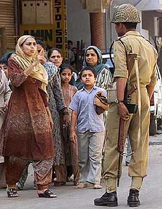 A Muslim woman complains to a BSF man