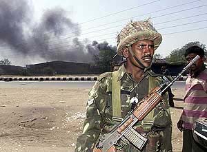 A soldier patrols