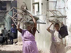 Local residents salvage their belongings