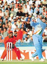 Sourav Ganguly hits a six off Grant Flower