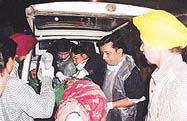 A person injured in the blast on the Dhanbad Express is taken to hospital