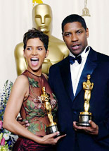 Actress Halle Berry and actor Denzel Washington hold up their Oscars at the 74th Annual Academy Awards