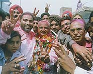 Mr Nathu Ram, CPI-Congress alliance candidate, is garlanded by his supporters