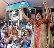 Employees of the State Bank of India hold a demonstration