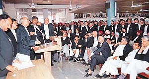 High Court Bar Association President H.S. Hooda addresses a meeting of the Bar 