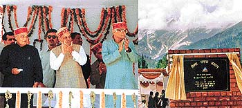 Prime Minister Atal Behari Vajpayee presses the button to unveil the foundation stone