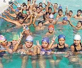 Medal winners of the District Sub-junior and Junior Swimming Championship in a jubilant mood