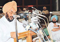 Punjab Finance Minister Lal Singh presents the Budget in the Vidhan Sabha in Chandigarh on Wednesday as Chief Minister Amarinder Singh looks on.