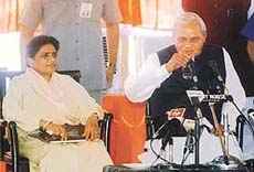 Prime Minister Atal Behari Vajpayee has a sip of water 