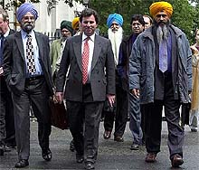 British Opposition Conservative Home Secretary Oliver Letwin and members of the Sikh lobby