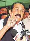 Vaiko speaks to the media at Mumbai airport.