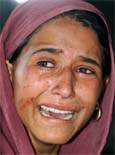 The wife of an Ikhwani militant cries after her husband was killed in a bomb explosion