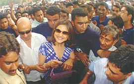 Preity Zinta is mobbed by fans