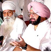 Punjab Chief Minister Amarinder Singh along with new PPCC chief H.S. Hanspal 
