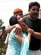 Wailing relatives of J&K police Sub-Inspector