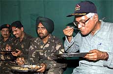 Defence Minister George Fernandes at a lunch with jawans