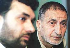 Abdul Ghani Bhat, chairman of the All-Party Hurriyat Conference, and Javid Mir, a conference executive member, during a press conference in Srinagar on Saturday.