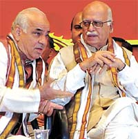 Mr L. K. Advani flanked by Mr Madan Lal Khurana at a political conference