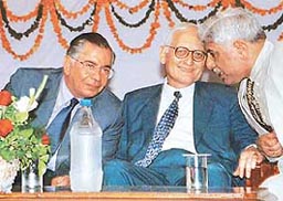 The Chief Justice of India, Mr Justice B.N. Kirpal is all ears as Mr Justice N.K. Sodhi makes a point to him