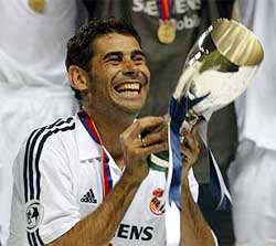 Formula  Qualifying on Real Madrid S Captain Fernando Hierro Holds The Uefa Super Cup Trophy